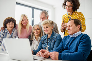 Group of Senior Adults Learning Computer Skills